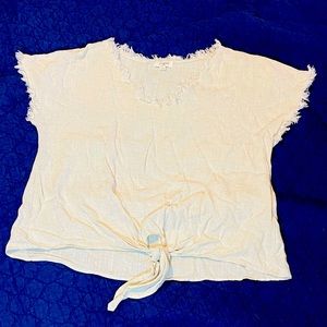 This adorable UMGEE Linen/Rayon blend cap sleeve top in a natural linen color.